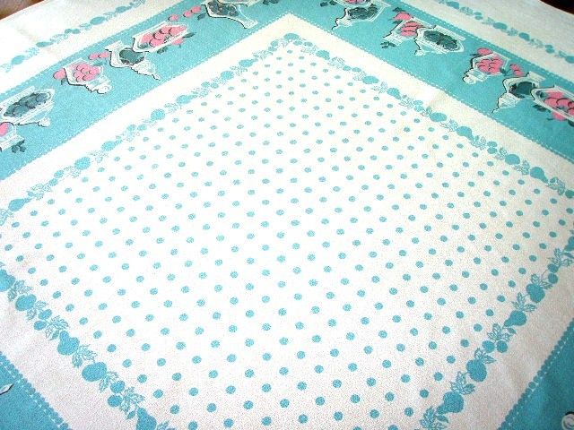 The centerfield is a riot of robins egg blue polka dots framed by tiny 