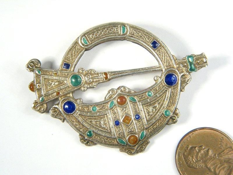   beautiful and very distinctive pin   wearable and highly collectable